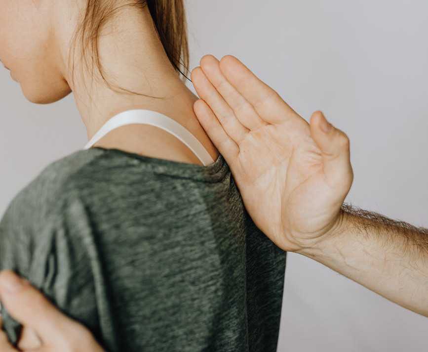 Chiropractor Performing Adjustment